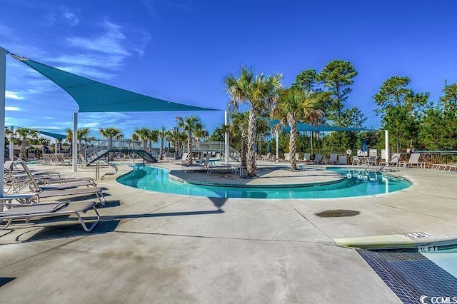 100 Culpepper Way Unit 1002, Myrtle Beach, SC 29579 - community pool with a patio area