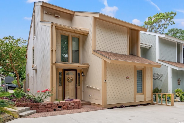 310 74th Ave N Unit 7, Myrtle Beach, SC 29572 - view of front facade with a shingled roof