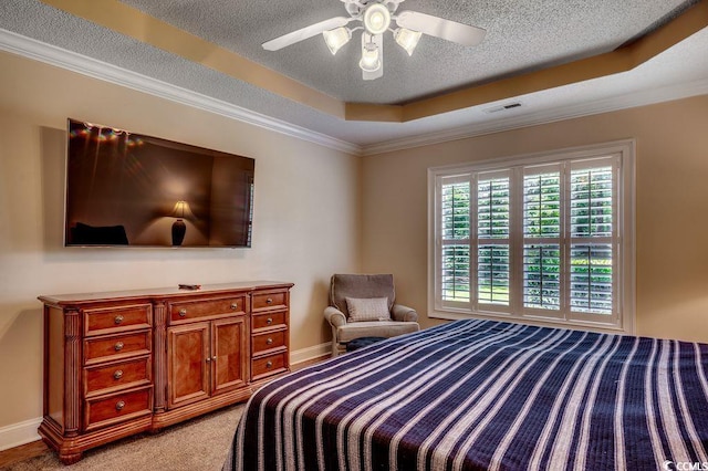 2450 Marsh Glen Dr Unit 112, North Myrtle Beach, SC 29582 - bedroom with a raised ceiling, a textured ceiling, crown molding, light colored carpet, and ceiling fan