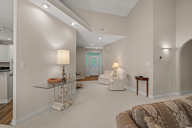 907 Tidewater Dr, North Myrtle Beach, SC 29582 - carpeted bedroom featuring arched walkways, recessed lighting, and wood finished floors