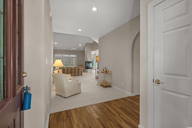 907 Tidewater Dr, North Myrtle Beach, SC 29582 - entrance foyer with arched walkways, wood finished floors, and recessed lighting