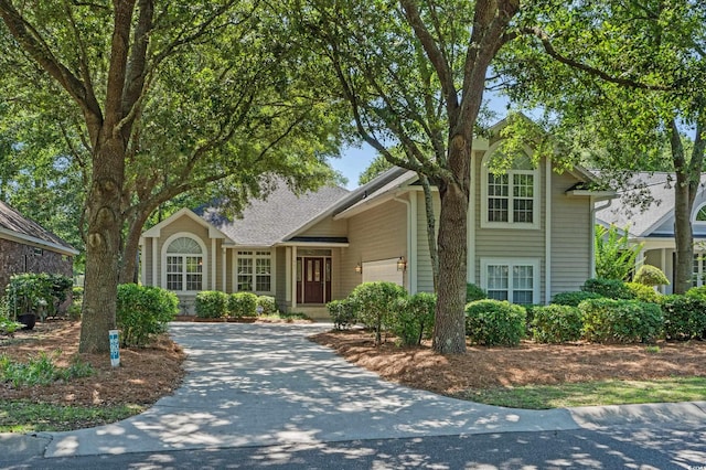 907 Tidewater Dr, North Myrtle Beach, SC 29582 - traditional-style house featuring a garage