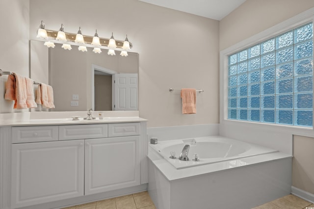 907 Tidewater Dr, North Myrtle Beach, SC 29582 - full bathroom featuring tile patterned floors, vanity, and a bath