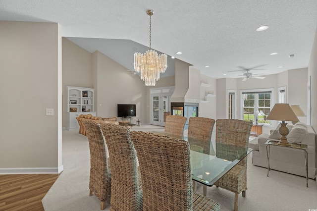 907 Tidewater Dr, North Myrtle Beach, SC 29582 - dining space featuring a textured ceiling, a chandelier, recessed lighting, a ceiling fan, and light wood-style flooring