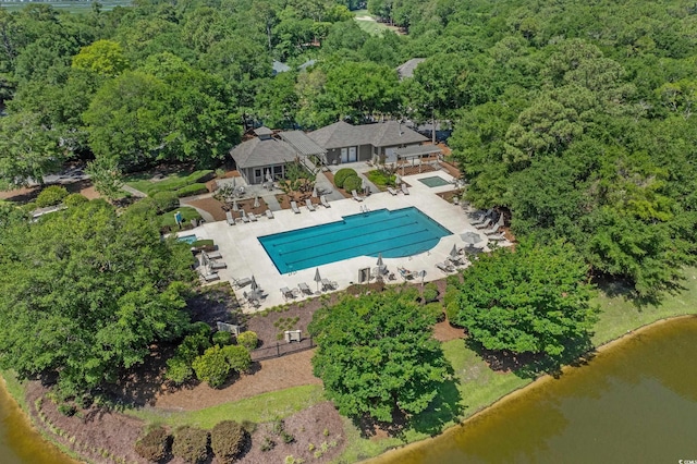 907 Tidewater Dr, North Myrtle Beach, SC 29582 - aerial view of property and surrounding area featuring a large body of water and a pool area