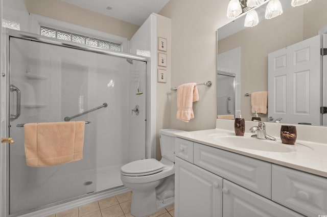 907 Tidewater Dr, North Myrtle Beach, SC 29582 - bathroom with tile patterned floors, vanity, and a stall shower