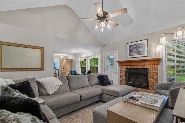 311 Ashwood Ln, Myrtle Beach, SC 29588 - living room with a chandelier, a fireplace, ceiling fan, and high vaulted ceiling