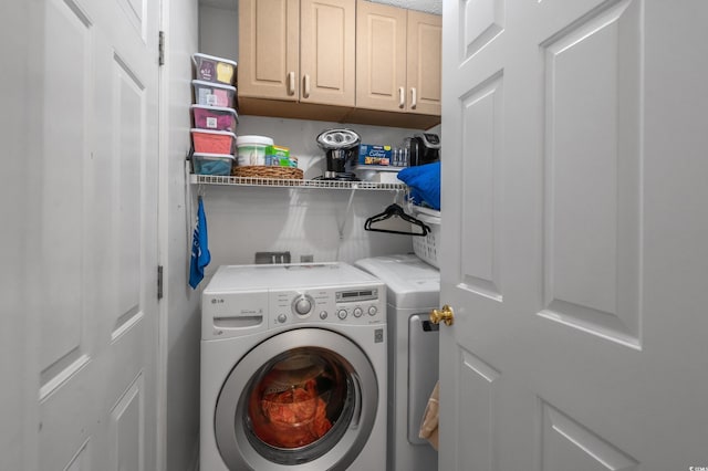 311 Ashwood Ln, Myrtle Beach, SC 29588 - laundry area featuring washing machine and dryer and cabinet space