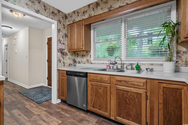 311 Ashwood Ln, Myrtle Beach, SC 29588 - kitchen featuring dishwasher, wallpapered walls, dark wood finished floors, light countertops, and brown cabinets