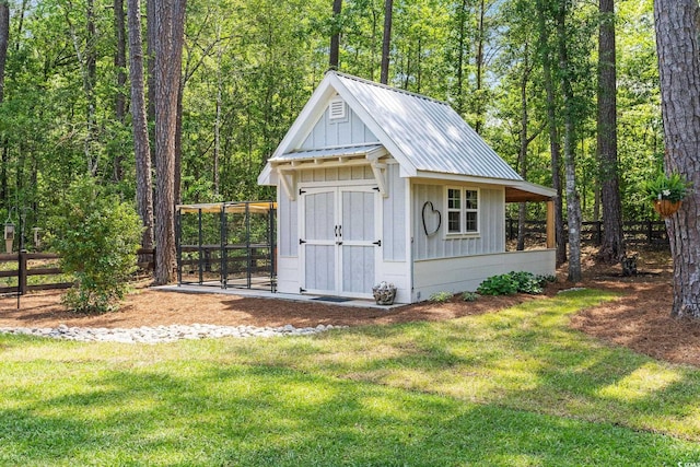 589 Boundaryline Dr NW, Calabash, NC 28467 - view of outbuilding with a view of trees