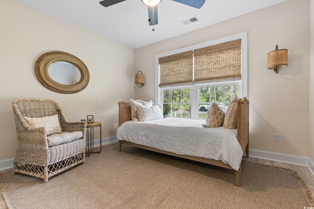 589 Boundaryline Dr NW, Calabash, NC 28467 - bedroom with baseboards and ceiling fan