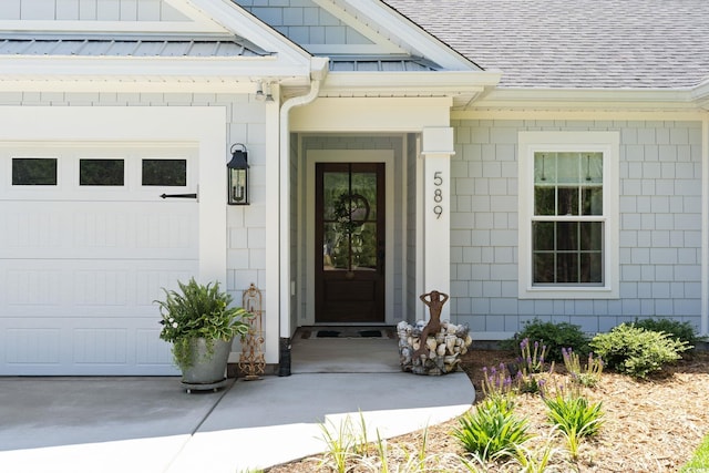 589 Boundaryline Dr NW, Calabash, NC 28467 - property entrance with a shingled roof and an attached garage