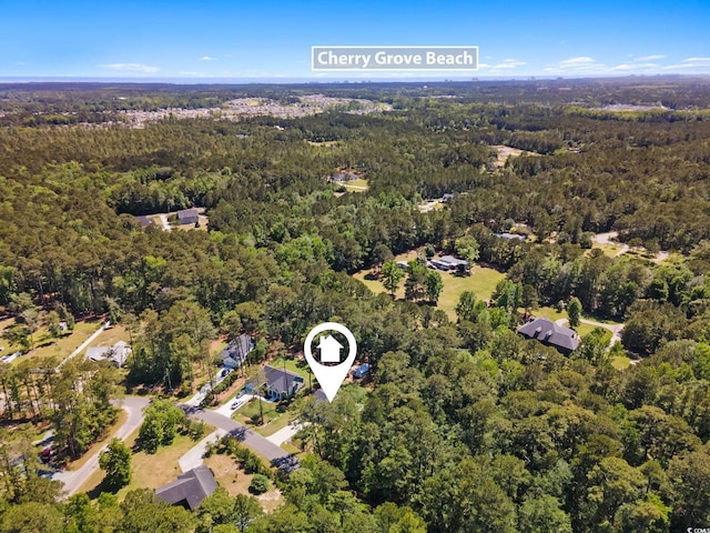 589 Boundaryline Dr NW, Calabash, NC 28467 - view of property location featuring a forest