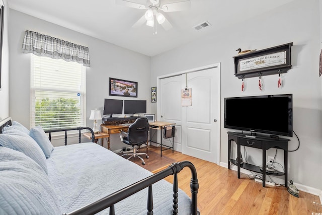 138 Copper Leaf Dr, Myrtle Beach, SC 29588 - bedroom featuring a closet, light wood-type flooring, a ceiling fan, and an office area