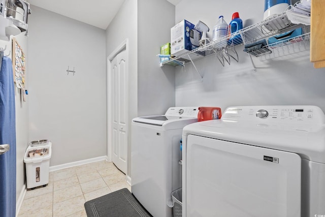 138 Copper Leaf Dr, Myrtle Beach, SC 29588 - washroom featuring washing machine and clothes dryer and light tile patterned flooring