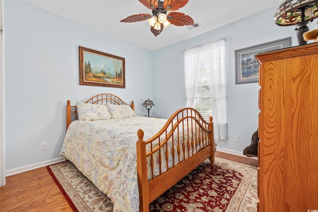 138 Copper Leaf Dr, Myrtle Beach, SC 29588 - bedroom with wood finished floors and a ceiling fan