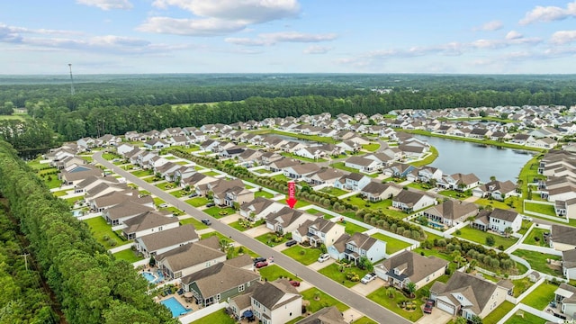 138 Copper Leaf Dr, Myrtle Beach, SC 29588 - aerial perspective of suburban area with a forest and a large body of water