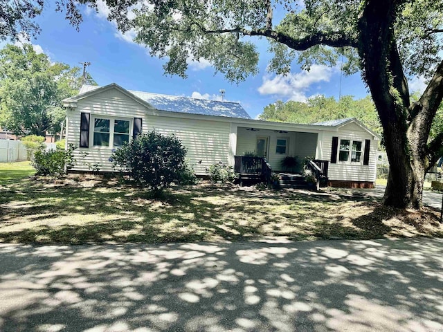 518 Nowell St, Georgetown, SC 29440 - rear view of property featuring covered porch, a metal roof, and a ceiling fan