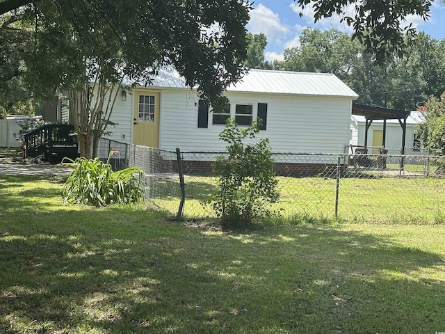 518 Nowell St, Georgetown, SC 29440 - back of property featuring a metal roof