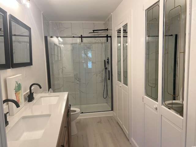 518 Nowell St, Georgetown, SC 29440 - full bath with wood finished floors, double vanity, and a marble finish shower