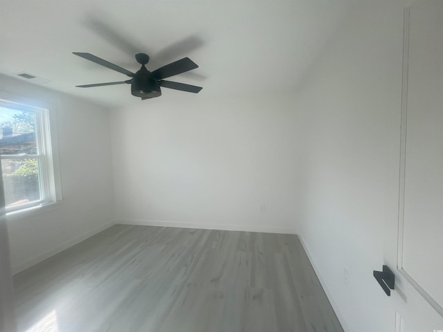 518 Nowell St, Georgetown, SC 29440 - empty room featuring light wood finished floors and a ceiling fan