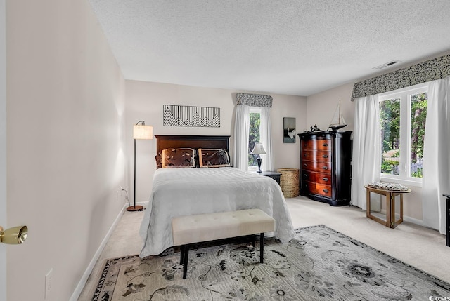 1064 Links Rd, Surfside Beach, SC 29575 - bedroom with light colored carpet and a textured ceiling