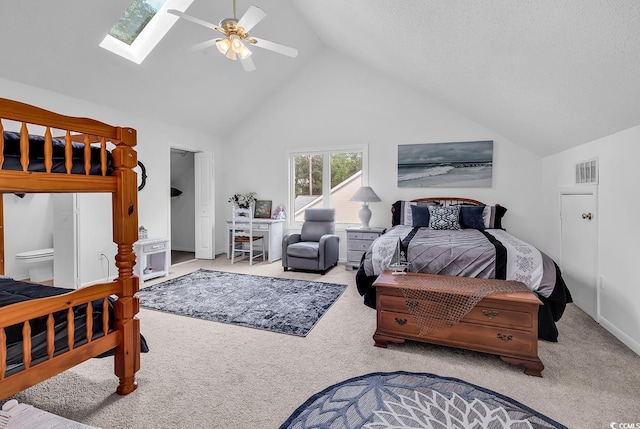 1064 Links Rd, Surfside Beach, SC 29575 - carpeted bedroom featuring a skylight, ceiling fan, and high vaulted ceiling