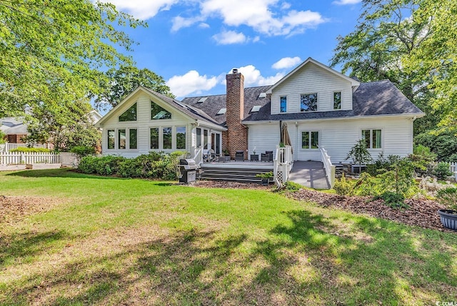1064 Links Rd, Surfside Beach, SC 29575 - rear view of property featuring a chimney, a wooden deck, and a shingled roof