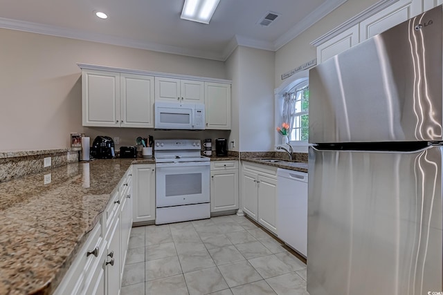 110 S Shore Blvd Unit 203, Longs, SC 29568 - kitchen with white appliances, crown molding, white cabinets, dark stone counters, and recessed lighting