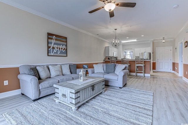 110 S Shore Blvd Unit 203, Longs, SC 29568 - living area with light wood-type flooring, a ceiling fan, crown molding, and a chandelier
