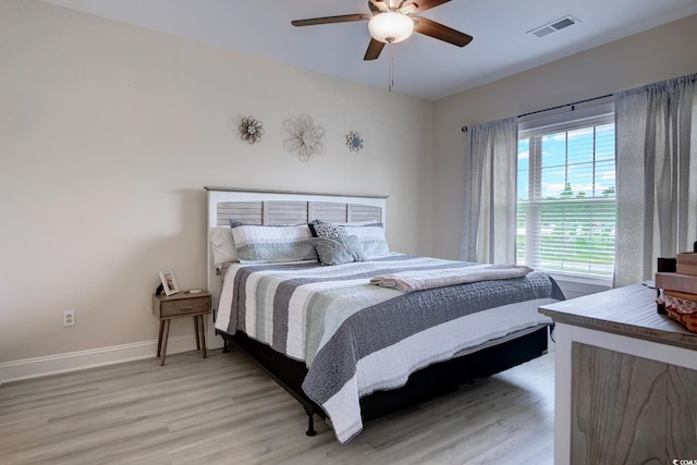 110 S Shore Blvd Unit 203, Longs, SC 29568 - bedroom featuring light wood finished floors and ceiling fan