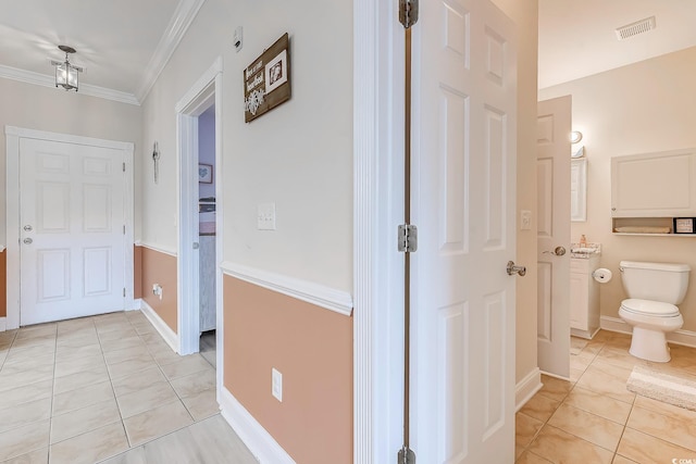 110 S Shore Blvd Unit 203, Longs, SC 29568 - hallway with light tile patterned flooring and ornamental molding