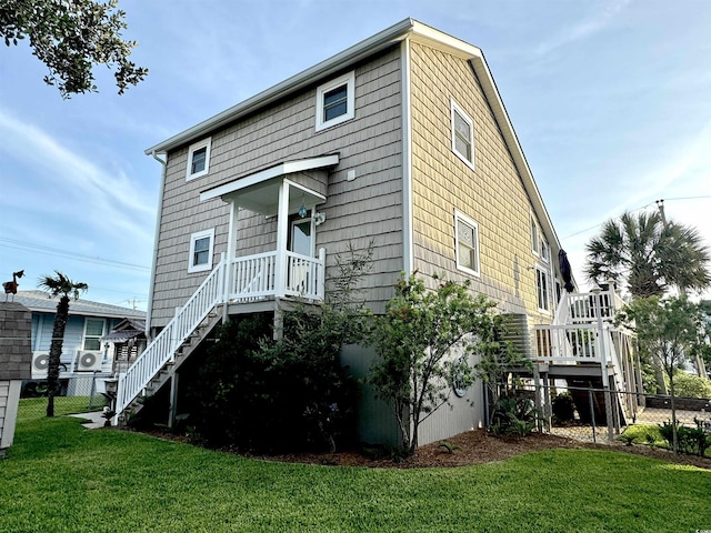 404 29th Ave N, North Myrtle Beach, SC 29582 - rear view of property featuring stairs