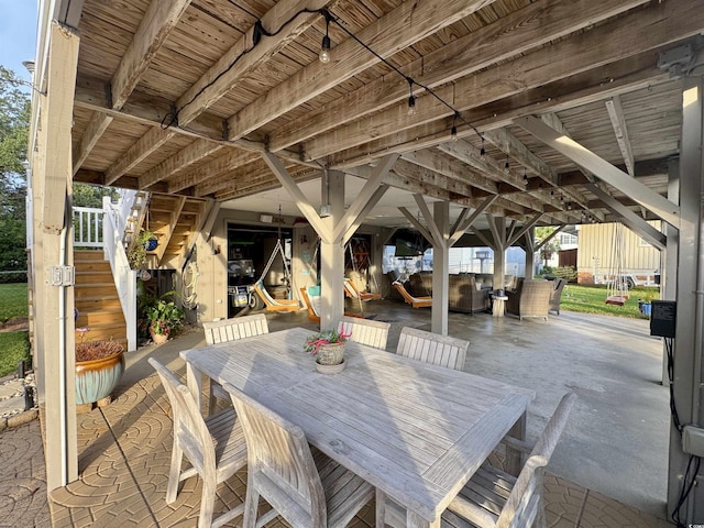 404 29th Ave N, North Myrtle Beach, SC 29582 - view of patio / terrace featuring stairway and outdoor dining space