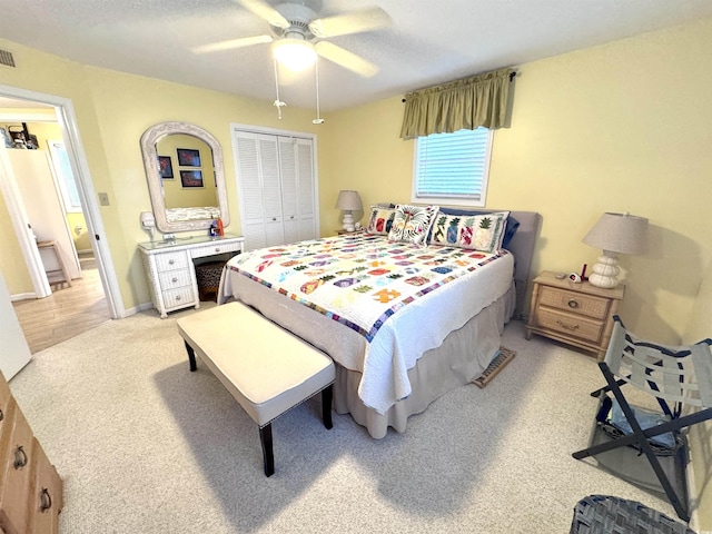 404 29th Ave N, North Myrtle Beach, SC 29582 - bedroom featuring light carpet, a closet, and ceiling fan