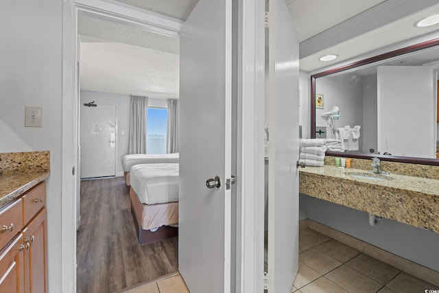 1501 S Ocean Blvd Unit 1039, Myrtle Beach, SC 29577 - ensuite bathroom with tile patterned flooring and vanity