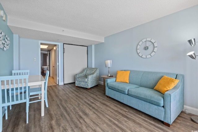 1501 S Ocean Blvd Unit 1039, Myrtle Beach, SC 29577 - living area featuring wood finished floors and a textured ceiling