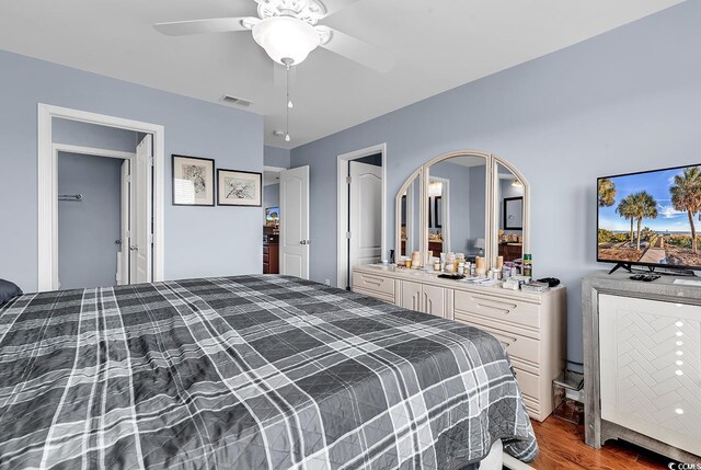 1857 Culbertson Ave Unit 1857, Myrtle Beach, SC 29577 - bedroom with wood finished floors, a ceiling fan, and arched walkways