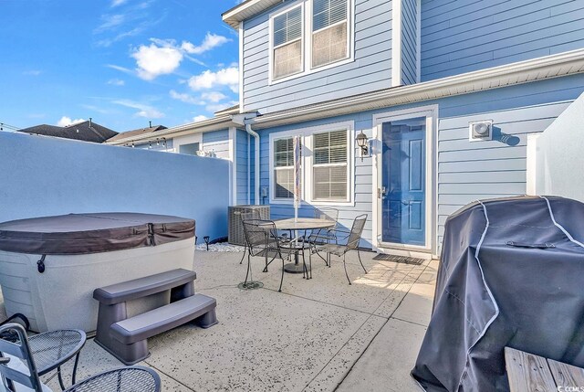 1857 Culbertson Ave Unit 1857, Myrtle Beach, SC 29577 - view of patio featuring a hot tub, a grill, and outdoor dining area
