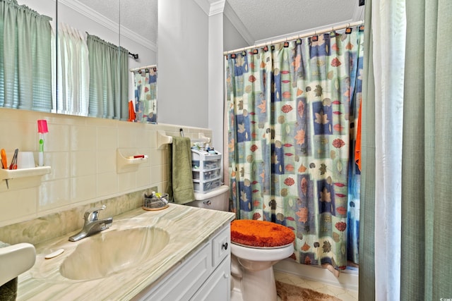 1005 S Main St, Mullins, SC 29574 - full bath featuring crown molding, vanity, a textured ceiling, tile patterned floors, and tile walls