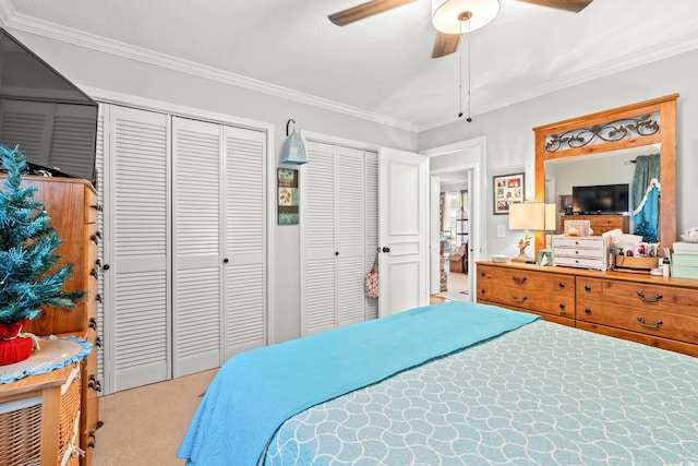 1005 S Main St, Mullins, SC 29574 - bedroom featuring carpet, two closets, ornamental molding, and ceiling fan