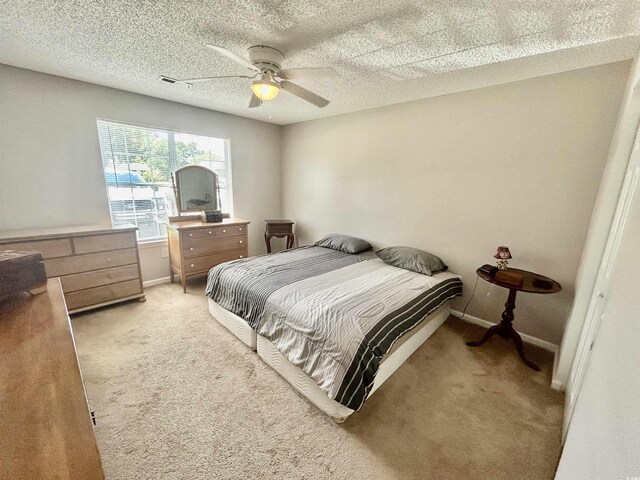 706 Jamie Ln, Conway, SC 29526 - bedroom with light colored carpet and ceiling fan