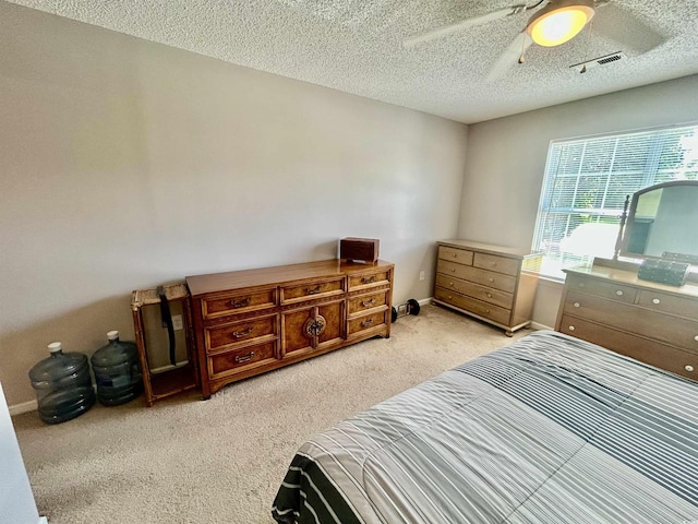 706 Jamie Ln, Conway, SC 29526 - bedroom with light carpet, ceiling fan, and a textured ceiling