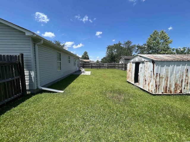 706 Jamie Ln, Conway, SC 29526 - fenced backyard featuring a storage unit