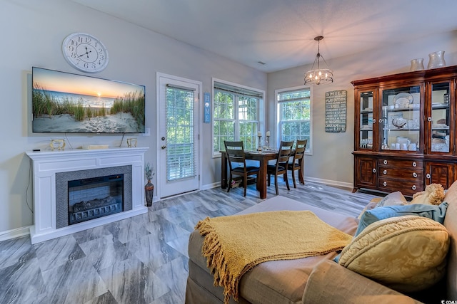 4355 Rivergate Ln Unit F, Little River, SC 29566 - living room with a fireplace and a chandelier