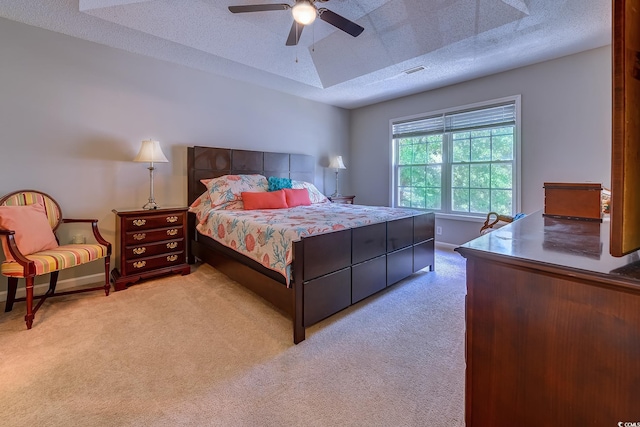 4355 Rivergate Ln Unit F, Little River, SC 29566 - bedroom featuring light colored carpet, a textured ceiling, and a ceiling fan