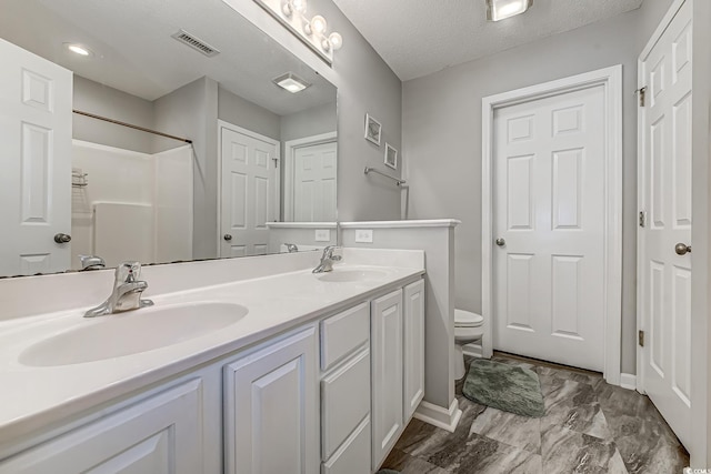 4355 Rivergate Ln Unit F, Little River, SC 29566 - bathroom featuring double vanity, a shower, and marble finish flooring