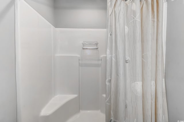 4355 Rivergate Ln Unit F, Little River, SC 29566 - bathroom featuring a shower with shower curtain