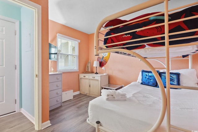 1011 S Ocean Blvd Unit 301, North Myrtle Beach, SC 29582 - bedroom with light wood-style flooring and baseboards