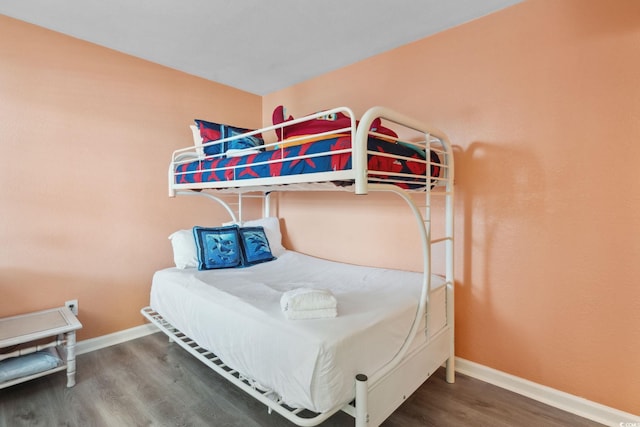 1011 S Ocean Blvd Unit 301, North Myrtle Beach, SC 29582 - bedroom with wood finished floors and baseboards